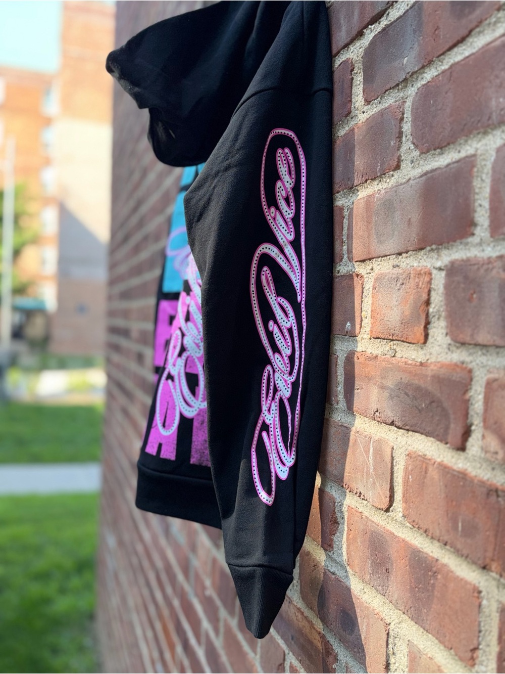 Evil Vice Black Graphic Hoodie with Pink & Teal Print